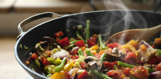 steaming mixed vegetables in the wok, asian style cooking vegetarian and healthy, selected focus, narrow depth of field