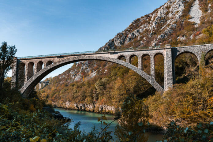 Beautiful stone arch railway on the Solkan bridge over Soca river in Slovenia