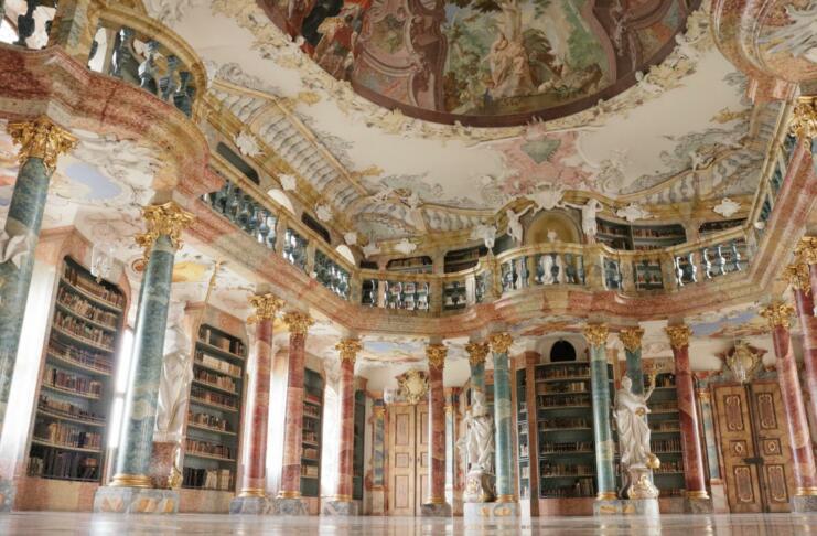 Wiblingen, Germany – July 09, 2022: A Rococo and Baroque decorations of the library in Wiblingen Abbey, near Ulm city, by architects Christian and Johann Wiedemann, 18th century.