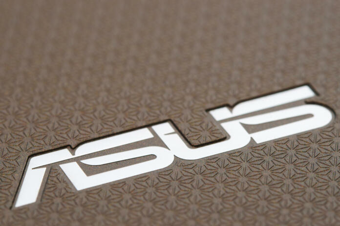 Celje, Slovenia - August 24, 2011: Asus logo on the back side of Eee Pad Transformer TF101 photographed diagonally. ASUSTek is one of the largest computer electronics manufacturer in the world. Eee Pad Transforme with Android 3.2 Honeycomb O.S. is direct competitor to Apple iPod.