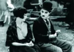charlie chaplin as tramp with circus horse rider