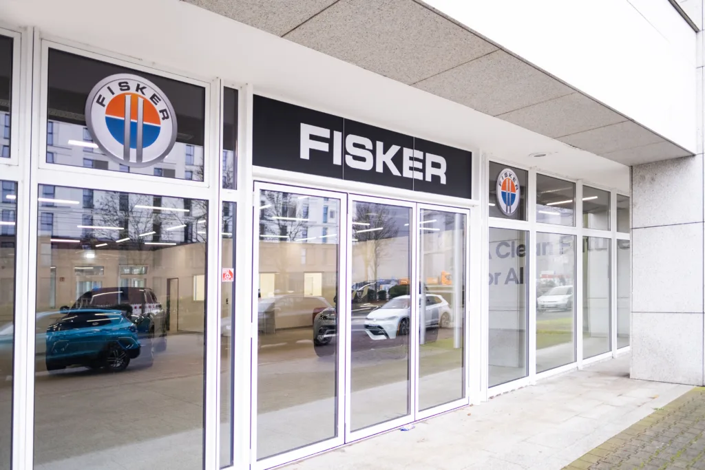 Advertising banners of Fisker, showroom Fisker Automotive Sales Office, emblem, concept Advertising and Marketing in Automotive Industry, American automobile manufacturer, Frankfurt - December 8, 2023