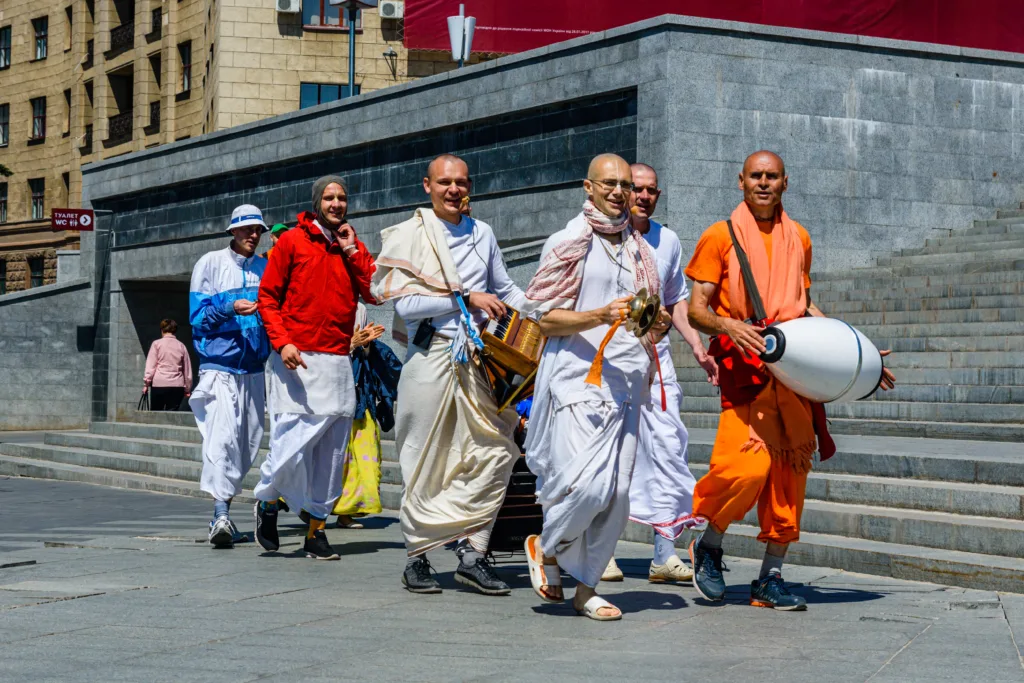 Kharkov, Ukraine - may 11, 2018: Hare Krishna people walking and singing on street in Kharkov, Ukraine