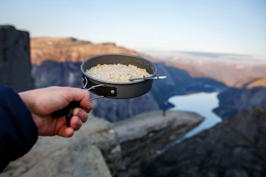 Oatmeal in a skillet. Breakfast on trolltunga, troll tongue, the most famous showplace in Norway