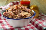 Pulled pork with vinegar barbecue sauce american style