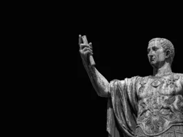 Caesar Augustus Nerva Emperor of Ancient Rome bronze statue along Imperial Fora road in Rome