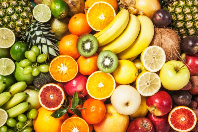 Fresh fruit background. Healthy eating and dieting concept. Winter assortment. Top view