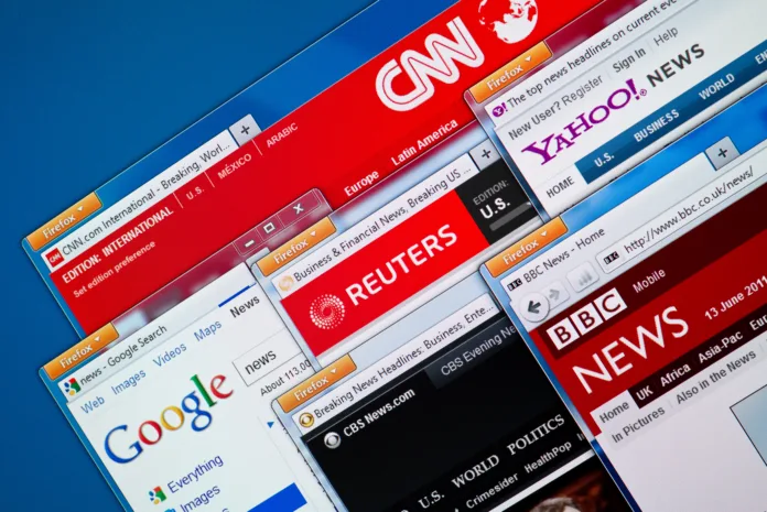 "Kiev, Ukraine - June 13, 2011: Top news web sites - CNN, Google News, Reuters, Yahoo News, BBC and CBS News in Firefox browsers on a computer screen. These news web sites the most visited and popular in the world."