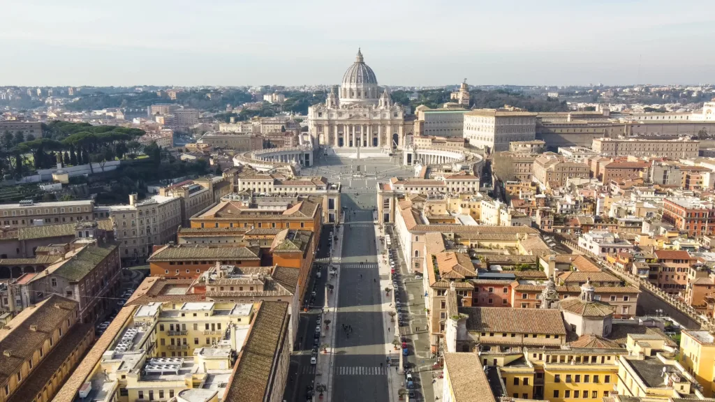 St. Peter’s Square (Piazza San Pietro), designed by Bernini, appears right in front of me. It’s still a mystery for me how 1.5 M people were able to gather here for the beatification of Pope John Paul II. Framed by the colonnades, four columns deep, the square holds two fountains, an obelisk, a renowned image of the Holy Mother, and St. Peter’s Basilica.