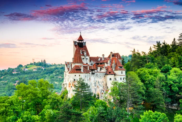 Bran, Romania - 19 July 2017: Bran Castle, Romania. Stunning HDR twilight image of Dracula fortress in Transylvania, medieval landmark.