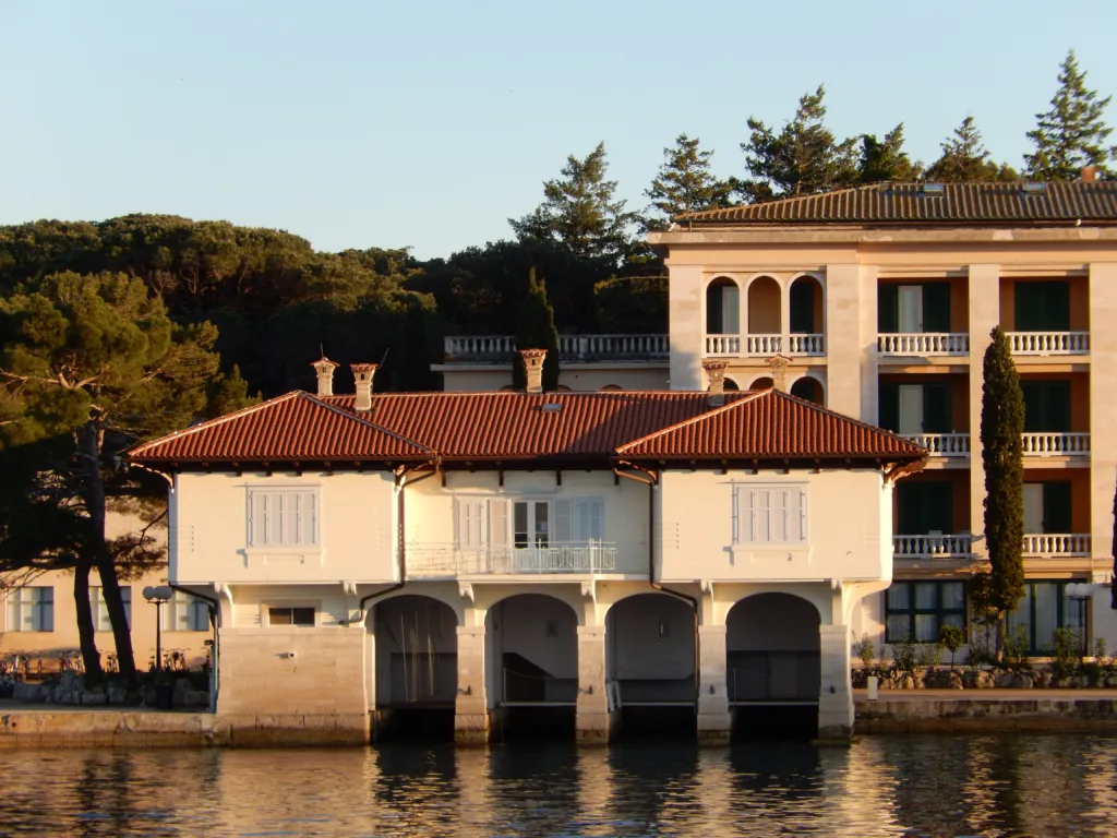 Brijuni, Croatia - April 29, 2016: White boat warehouse on the coast of Veliki Brijun, the largest of the Brijuni islands, Croatia.