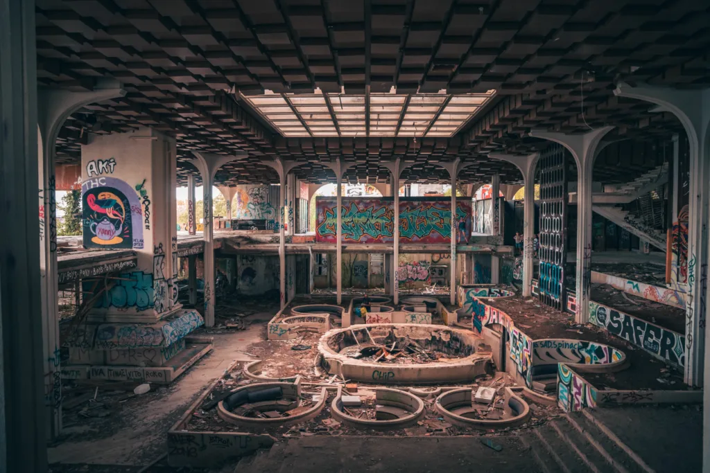 Haludovo, Croatia – August 26, 2022: A sepia view of the main entrance to the abandoned Haludovo Palace hotel on the island of Krk in Croatia