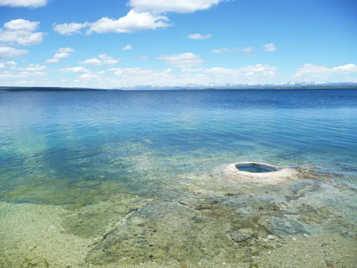 Lake with hydrothermal vents in Yellowstone National Park, Wyoming, USA.