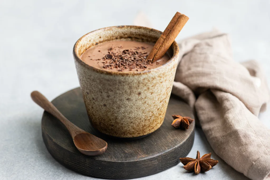 Champurrado, traditional mexican corn drink with chocolate, selective focus