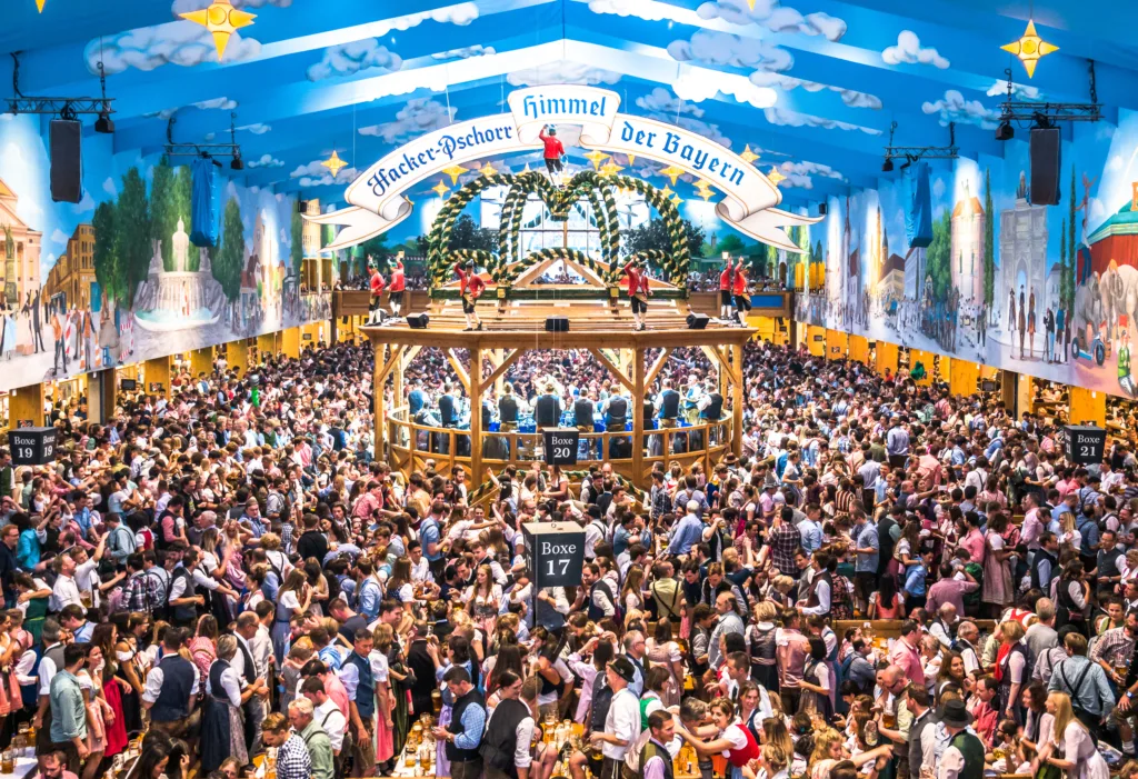 Munich, Germany - October 1: famous beer tent called Hacker-Pschorr and people at the biggest folk festival in the world - the oktoberfest on oktober 1, 2018 in munich.