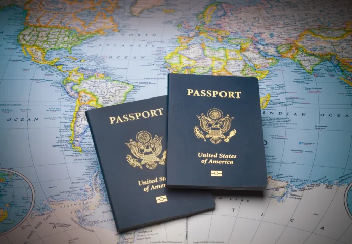 Passports on a map of the world to illustrate the keys to world travel