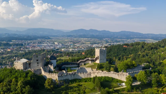 Celje, Slovenia - June 27, 2020: Celje Castle is a castle ruin in Celje, Slovenia, formerly the seat of the Counts of Celje. It stands on three hills to the southeast of Celje, where the river Savinja meanders into the Lasko valley