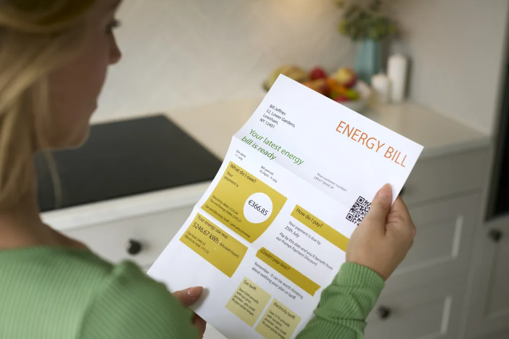 Close Up Of Woman Opening Euro Energy Bill During Cost Of Living Crisis