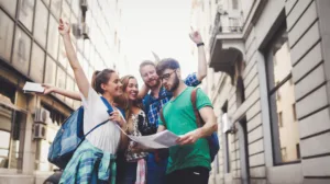 Happy group of tourists traveling and sightseeing together