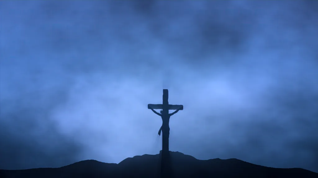 Jesus silhouette crucified on Calvary at night