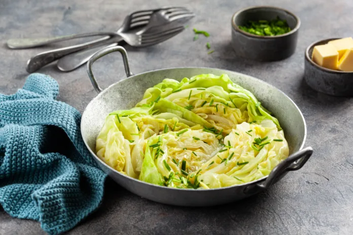 stewed steamed cabbage with butter, healthy vegetarian food