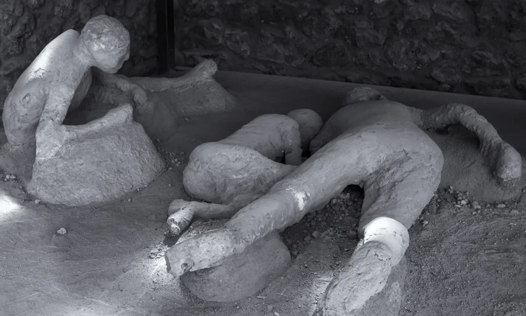 A plaster cast of victims in last moments of the eruption of the volcano Vesuvius 79 BC. Pompeii, Italy