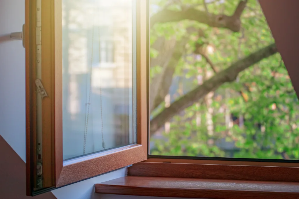 open window with wooden frame, cozy house