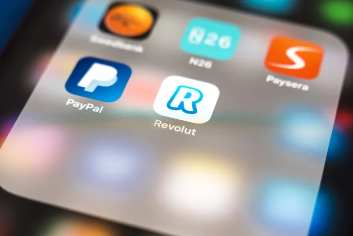 Revolut app logo. Revolut is a digital banking alternative that includes a pre-paid debit card, currency exchange, and peer-to-peer payments.