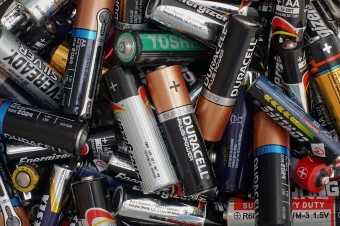 Athens, Greece - December 21, 2019: Battery recycling. Pile of used alkaline batteries.