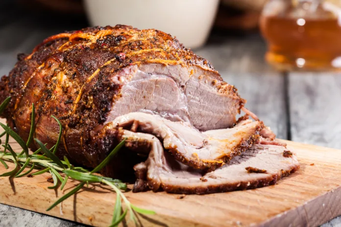 Roasted shoulder of pork on a cutting board